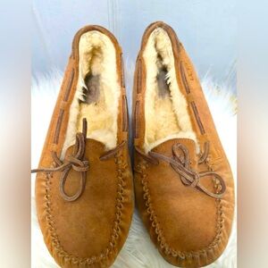 UGG Dakota moccasin slippers made with water-resistant suede.